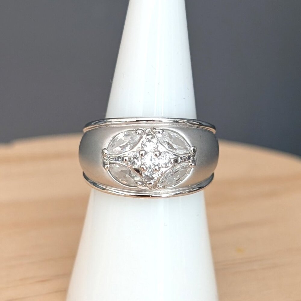 Matte brushed silver tone and faux diamond wide band ring